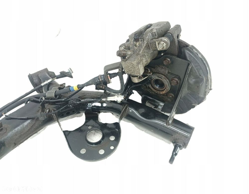 BELKA OŚ TYŁ TYLNA ZAWIESZENIA TARCZE SUZUKI SWIFT MK7 10-16R 4X4 - 6