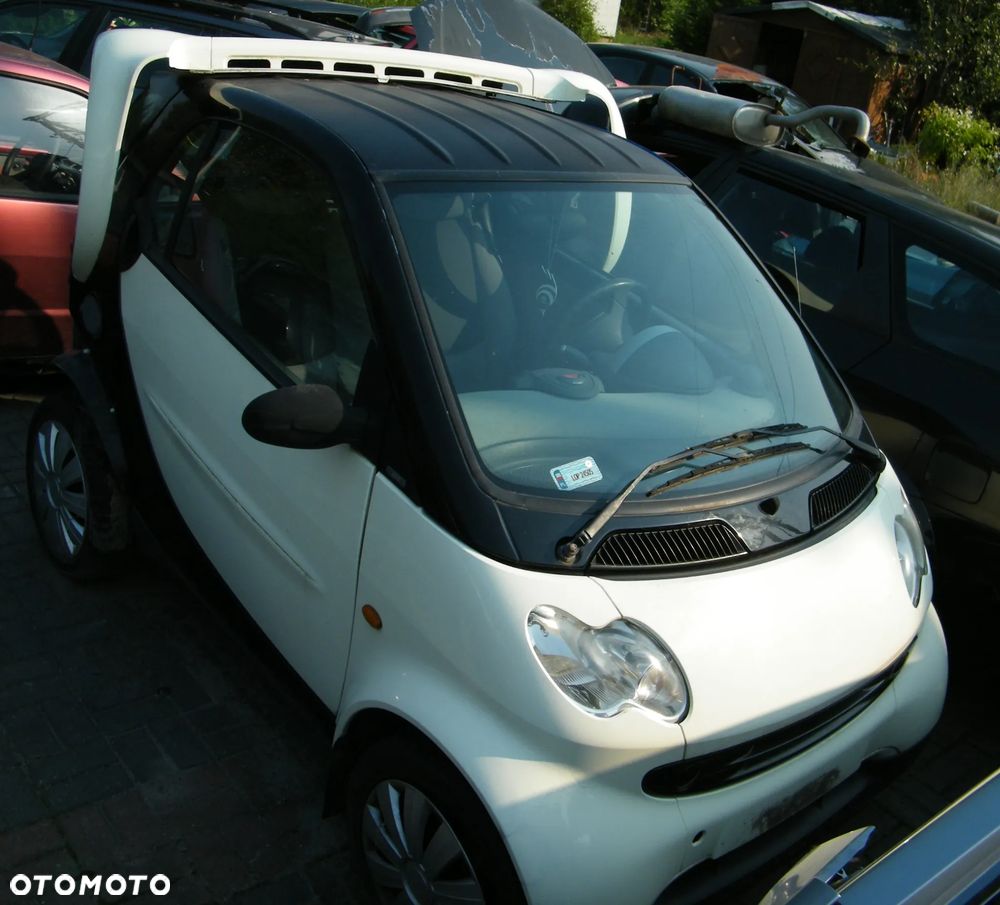 KOMPLETNY PRZÓD Smart ForTwo (Po Lift) (03-07r.) EB1  +  EA8 (Phat Red) kolor lakier Ecru + Czarny  Europa MASKA ZDERZAK BŁOTNIKI LAMPY PAS PRZEDNI BELKA CHŁODNICE PLASTIKI PODSZYBIA / PODSZYBIE do założenia bez malowania. - 3