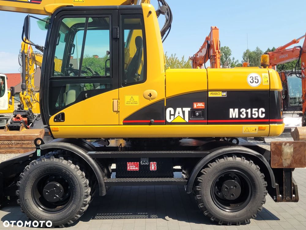 Caterpillar M315C / ROTOTILT ze szczypcami / ZADBANY EGZEMPLARZ / - 9