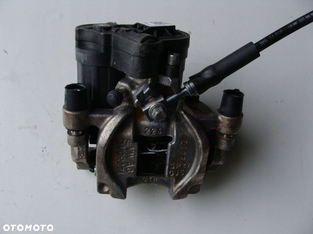 zacisk lewy tył audi a3 8v vw golf viioctavia iii leon iii 5q0615405ee - 1