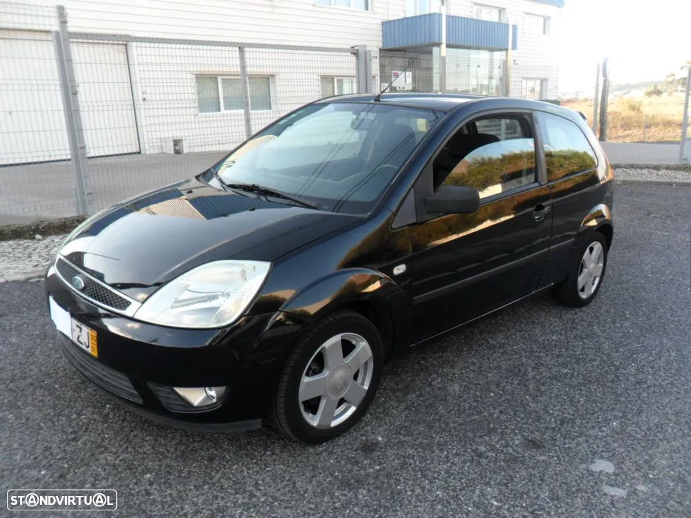 Ford Fiesta 1.4 TDCi Ghia - 11