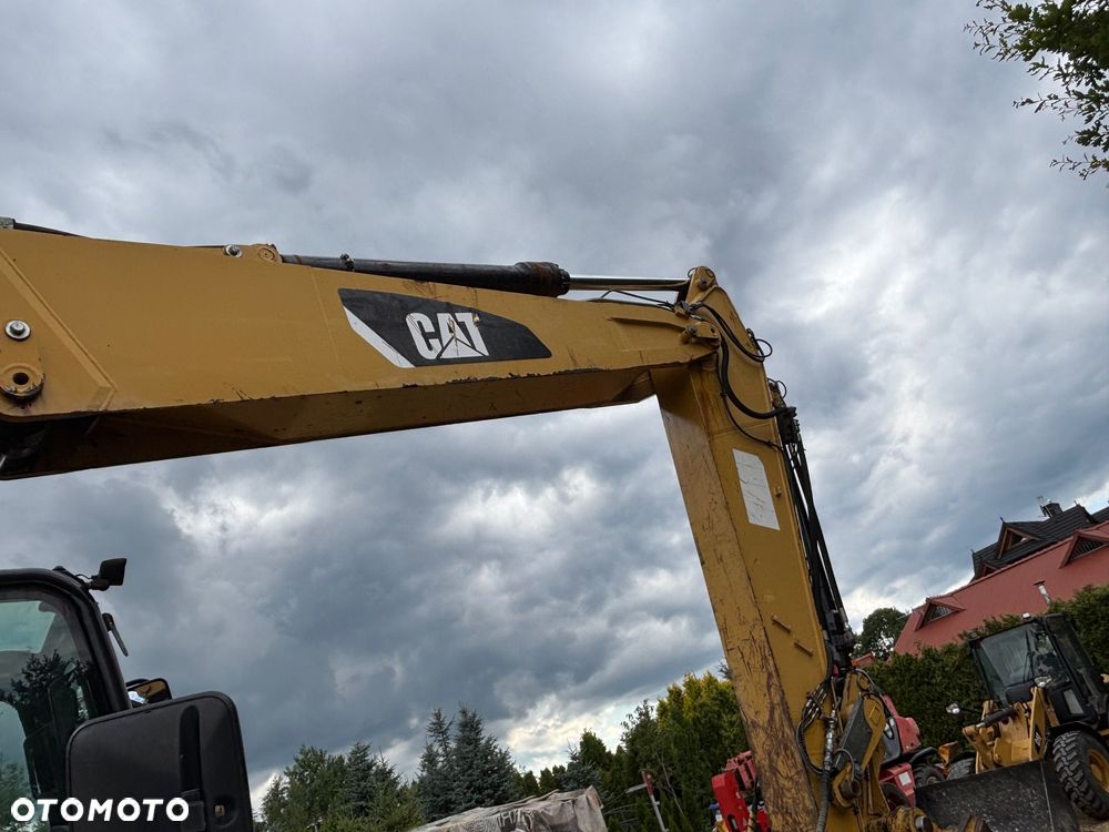 Caterpillar M315D 2010r podpory skarpowka 3 x składane ramie - 14