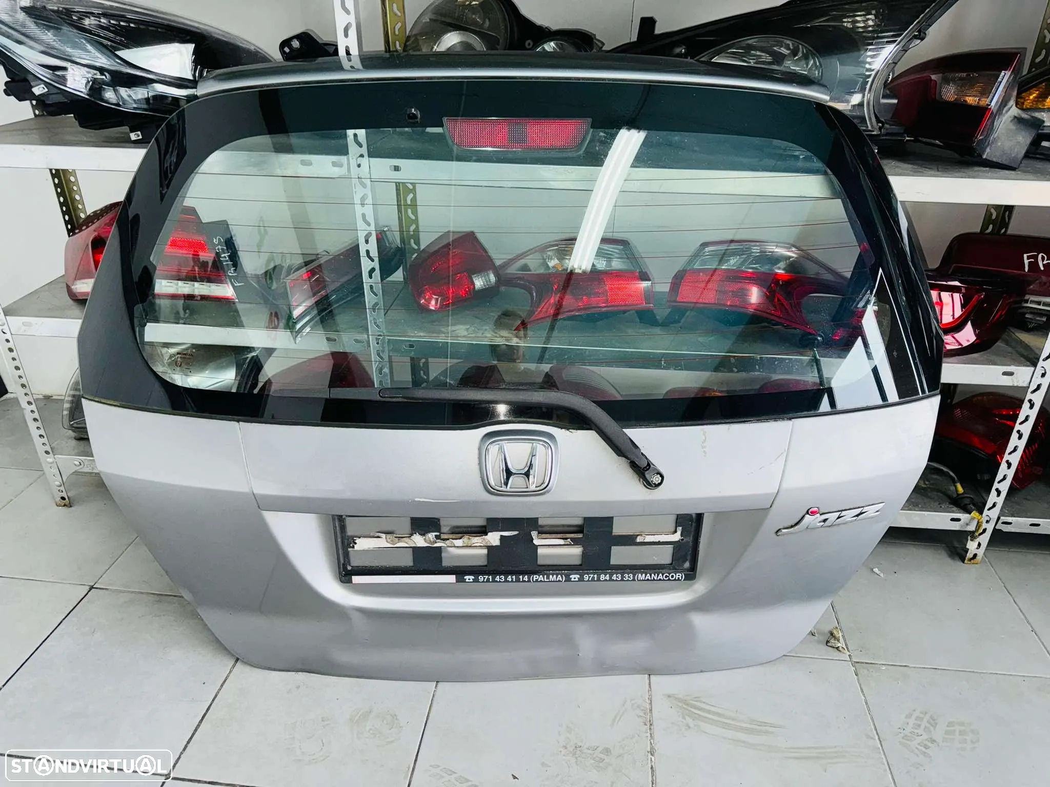 Tampa da Mala Honda Jazz - 2002 / 2004 - 1