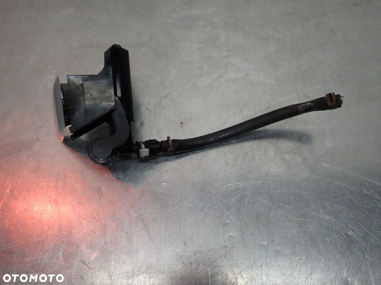 SPRYSKIWACZ LAMPY REFLEKTORA LEWY TOYOTA COROLLA E15 - 1