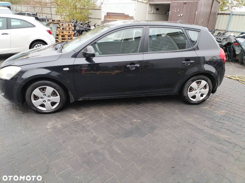 KOŁA FELGI KOŁPAKI OPONY CAŁOROCZNE 5X114,3 X15 FI67,1 185/65R15 KIA - 1