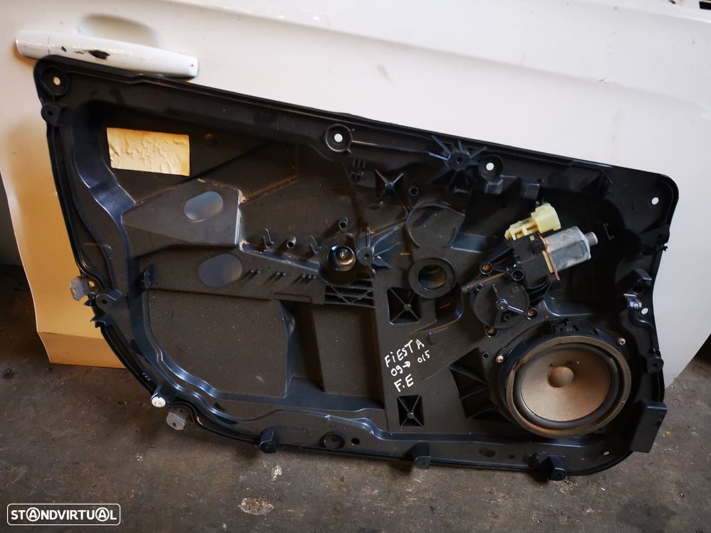 FORD FIESTA VI ELEVADOR FRENTE ESQUERDO - 1