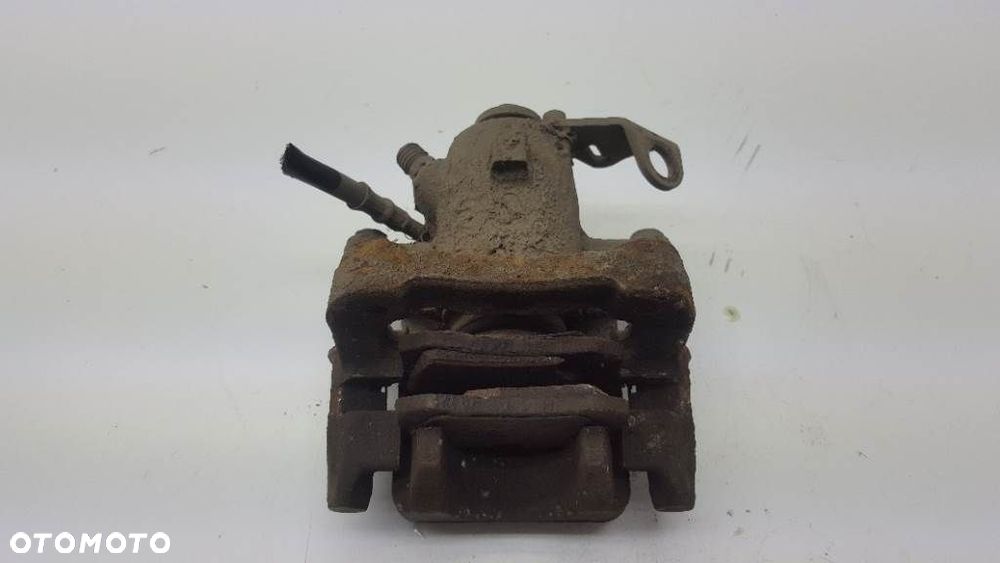 ZACISK HAMULCOWY TYŁ TYLNY PRAWY JARZMO SEAT TOLEDO II 1.9 TDI - 7