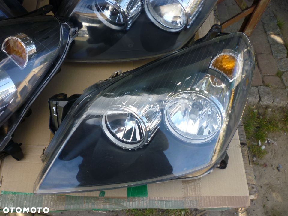 Lampa  lewa OPEL ASTRA H HELLA EUROPA - 2