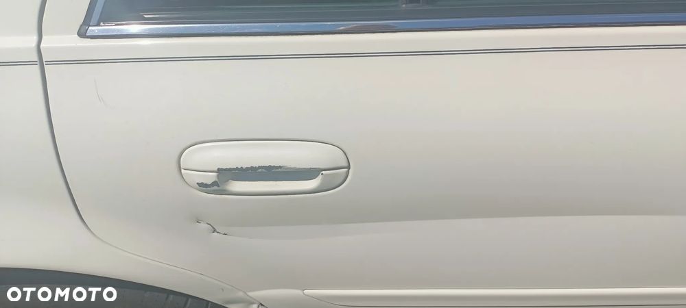 Cadillac Deville - 13