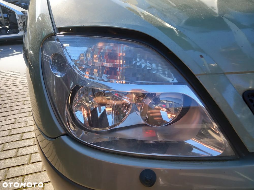 RENAULT SCENIC I LAMPA REFLEKTOR PRAWA PRZEDNIA PRAWY PRZÓD