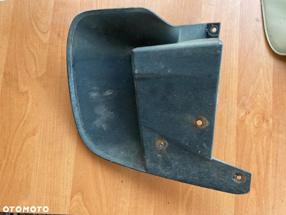 CHLAPACZ OSŁONA BŁOTNIKA PRZEDNI LEWY MITSUBISHI L200 5370B203 - 5