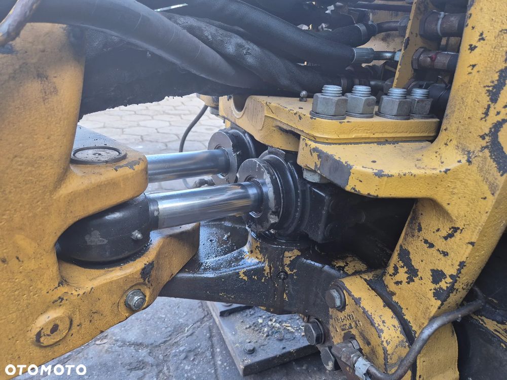 Caterpillar 428 E - 7