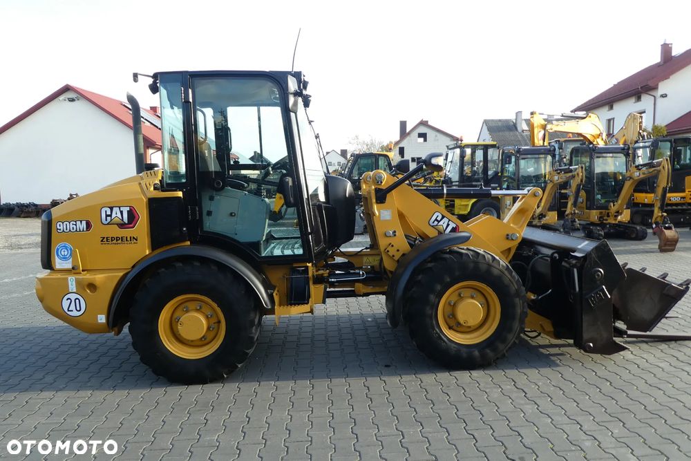 Caterpillar 906M Z KROKODYLEM I WIDŁAMI - 8