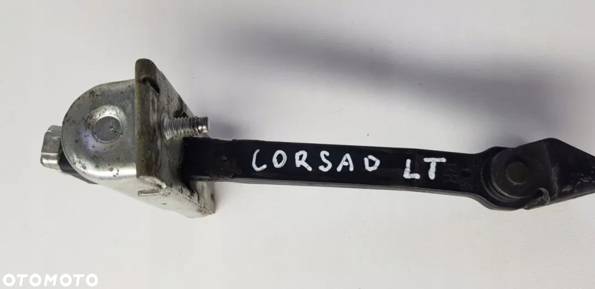 OGRANICZNIK DRZWI TYLNYCH LEWYCH OPEL CORSA D 5D - 3