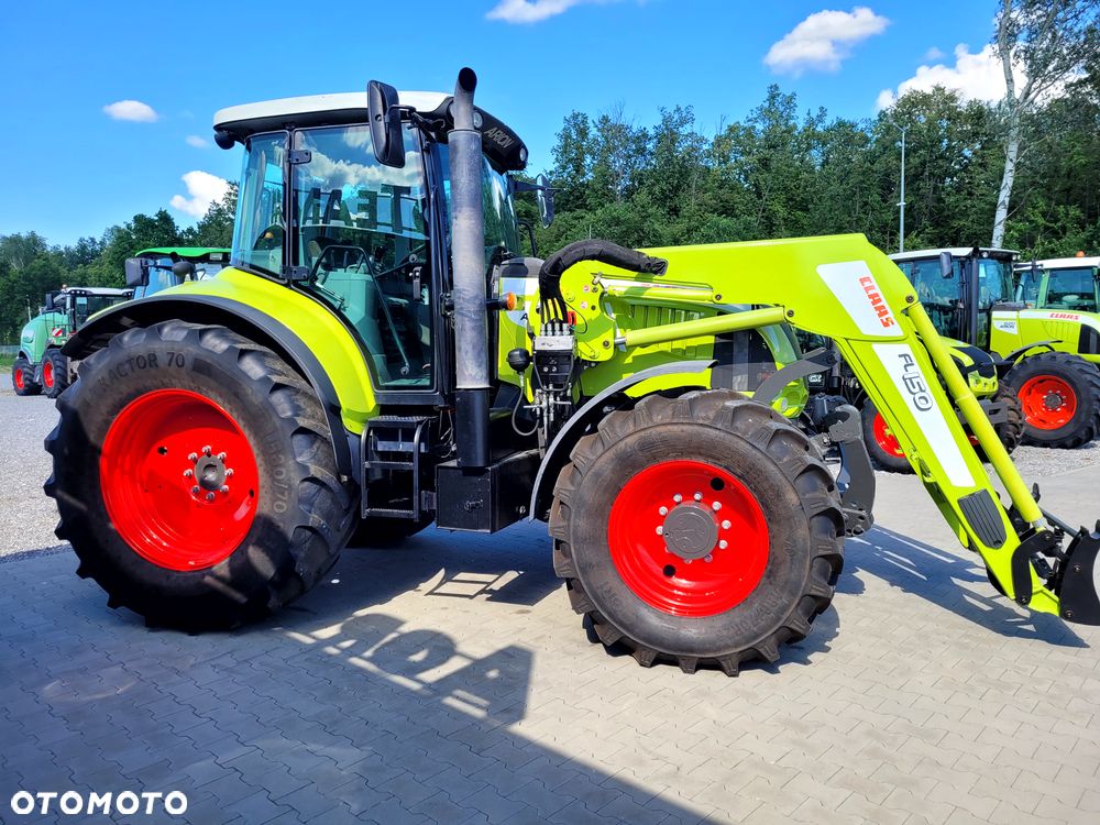 Claas ARION 640 CIS z ładowaczem FL 150 - 10