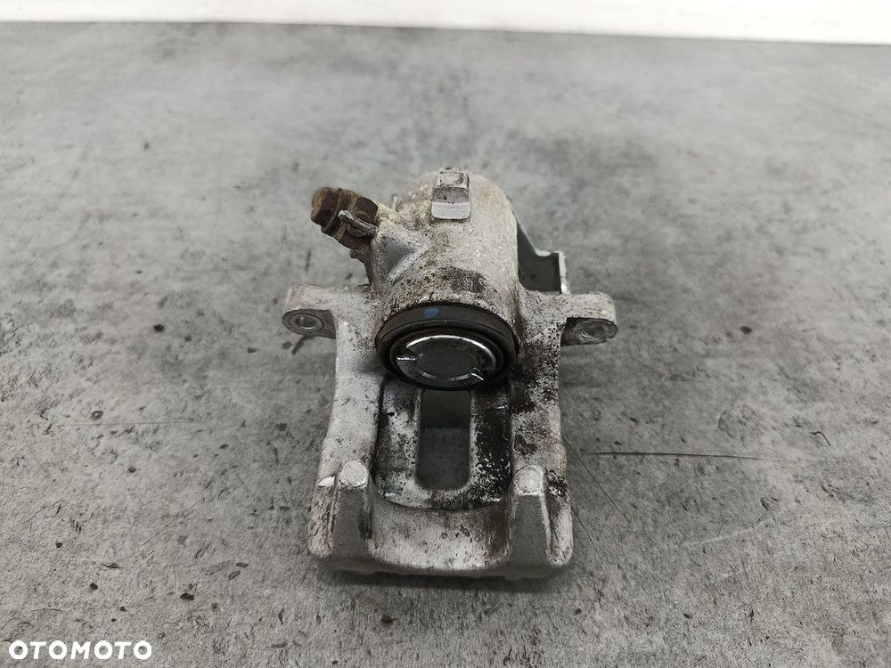 ZACISK HAMULCOWY PRAWY TYŁ AUDI A4 B6 23SKV324 SKV 1.9 TDI - 5