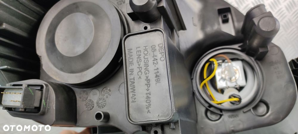 lampa reflektor lewy lewa przód przednia OPEL ZAFIRA B II 2 2005- EUROPA - 8