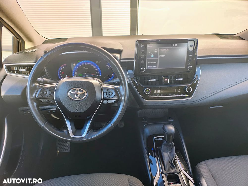 Toyota Corolla 1.8 HSD Business - 7