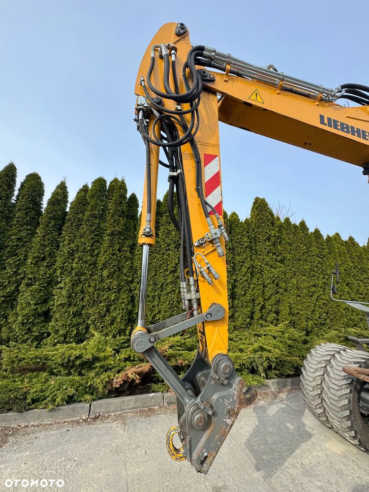 Liebherr 314 Litronic Rotator - 13