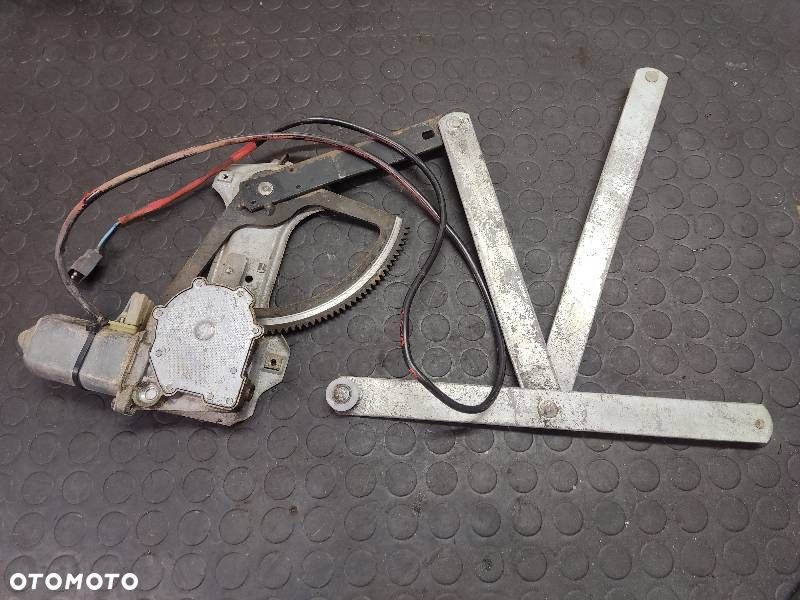 MECHANIZM SZYBY LEWY PRZÓD ELEKTRYCZNY VOLVO FL - 1