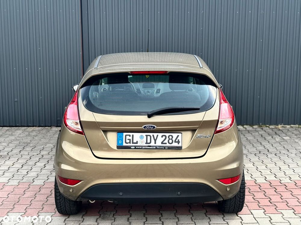 Ford Fiesta 1.25 Ghia - 7