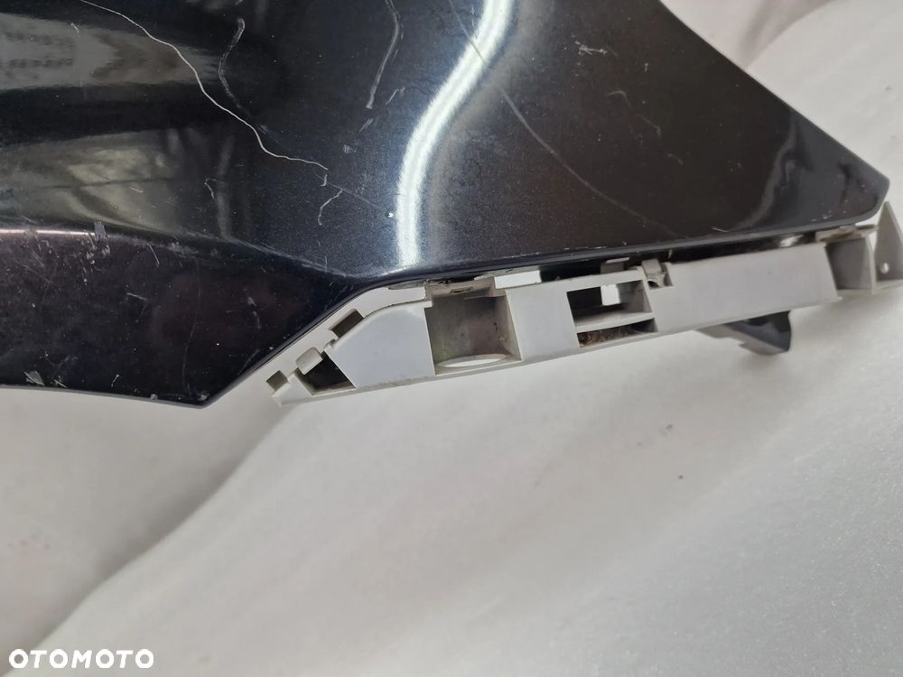 MAZDA 2 03-07 PRAWY BŁOTNIK PRZEDNI PRZÓD , NR AUKCJI BŁ215 - 14