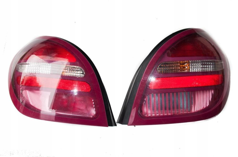 LAMPA TYŁ TYLNA PRAWA LEWA NISSAN ALMERA N16 OE 26550BN010 26555BN010 ORYGINAŁ
