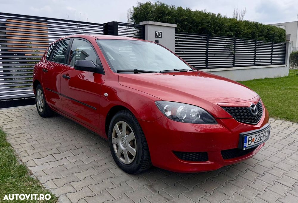 Mazda 3 G100 Emotion - 1