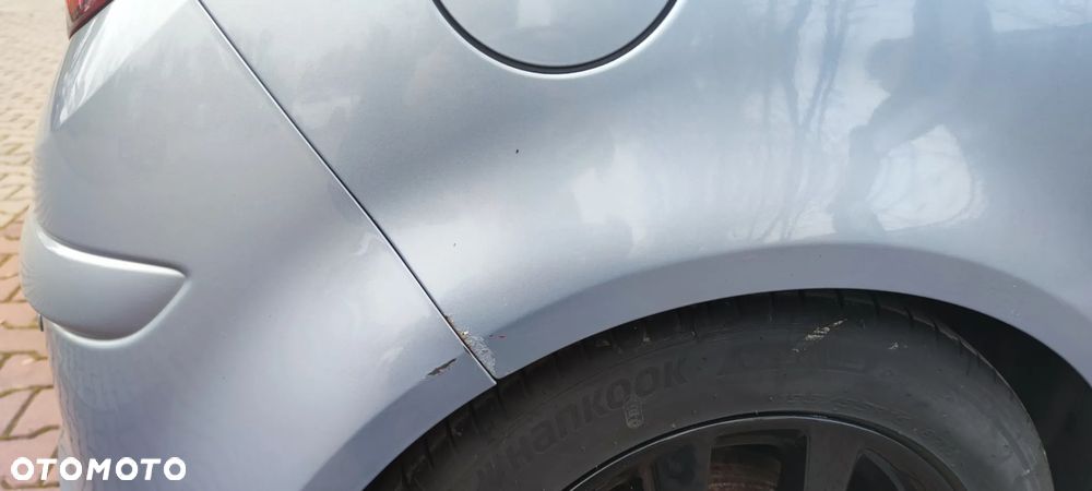 Opel Corsa 1.4 16V Cosmo - 6