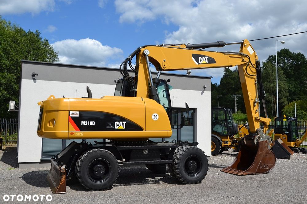Caterpillar 318 D - 11