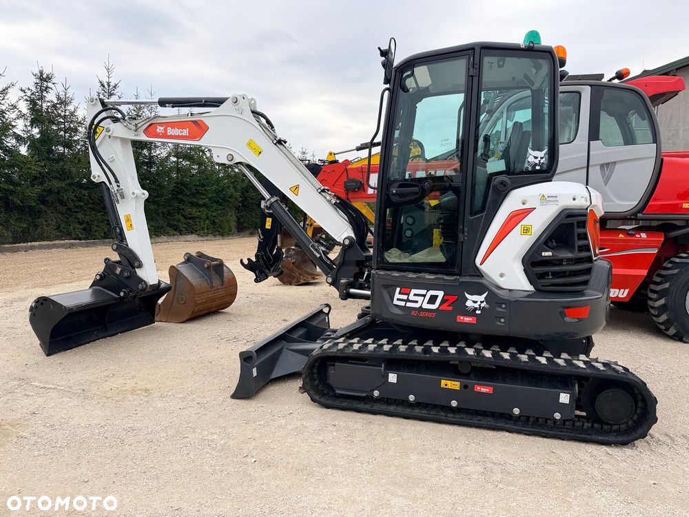 Bobcat Minikoparka Bobcat e50Z 5ton e55 e60 Cat 303.5 304  305 3xłyżki Ramię LOONG dodatkowe linie hydr wyjścia AUX1 + 2 przeciw waga MAX-dociążenie gąsienice 85% od nowości 1 właściciel z Niemiec Auto IDLEE po serwisie Widły wiertnica grabie i inne za dopłatą Szybkozłącze hydr Miller łyżka przedsiębierna Pług  Kubota Takeuchi Jcb - 3