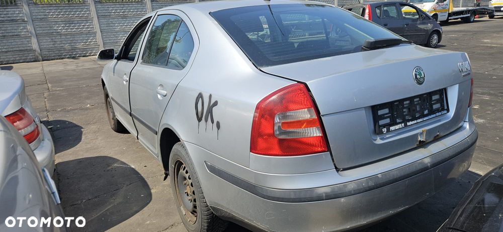 SKODA OCTAVIA II  04-08 1.9 TDI BKC - OSLONA PRZECIWSLONECZNA LEWA PRAWA - 16