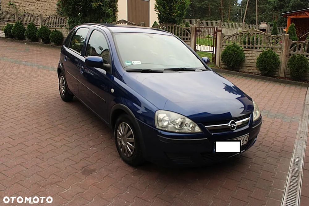 Opel Corsa 1.2 16V Cosmo - 1