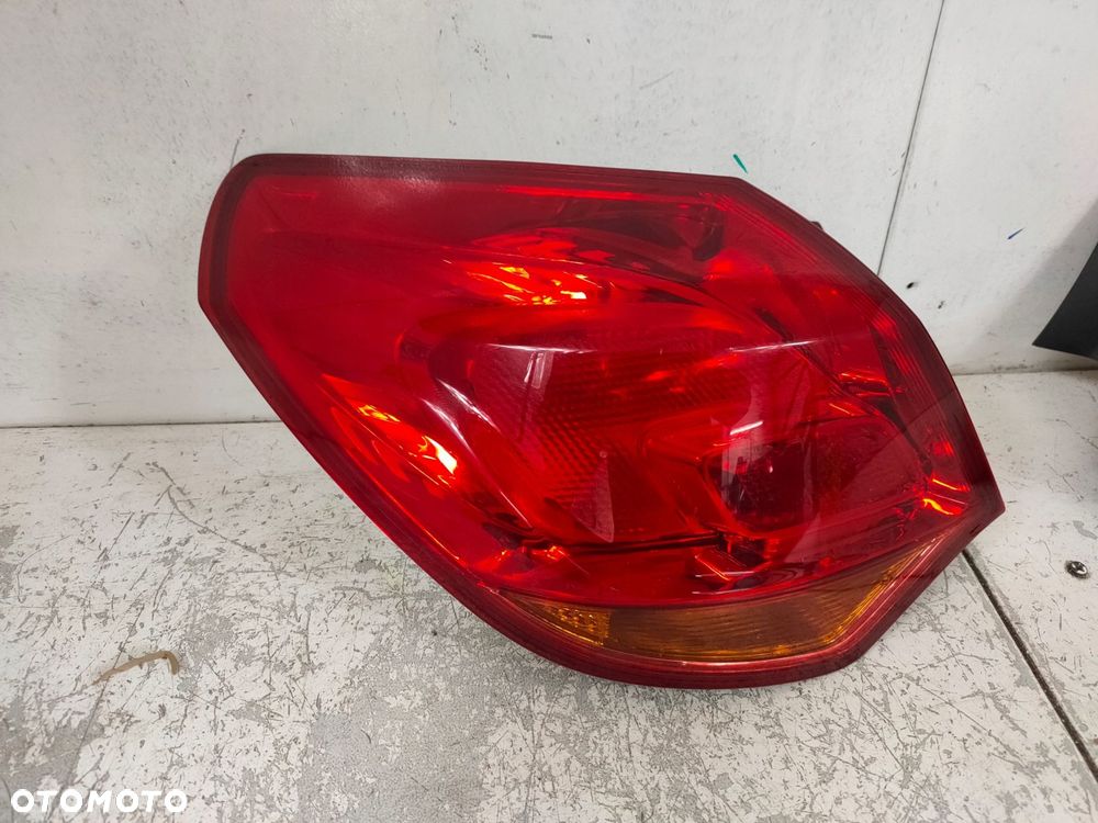 lampa prawa + lewa tył astra 4 j 5d hb jasna komplet - 2