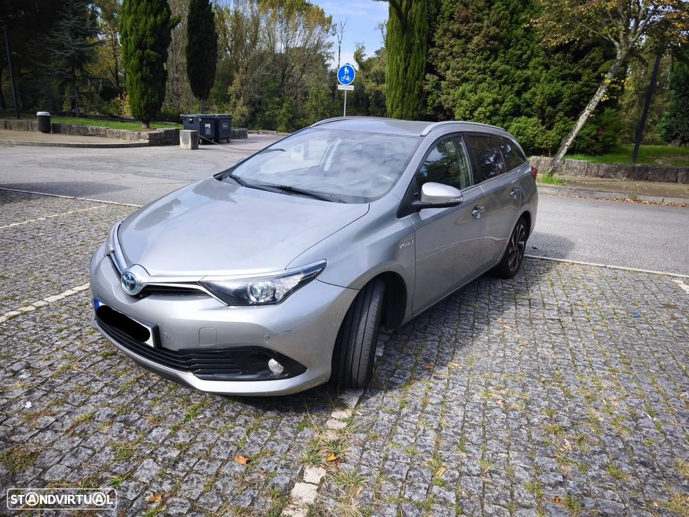 Toyota Auris Touring Sports 1.8 HSD Comfort+P.Sport - 1