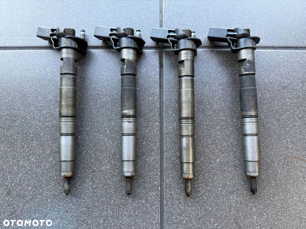 WTRYSKIWACZ 2.0 TDI VW AUDI SKODA 03L130277 - 1