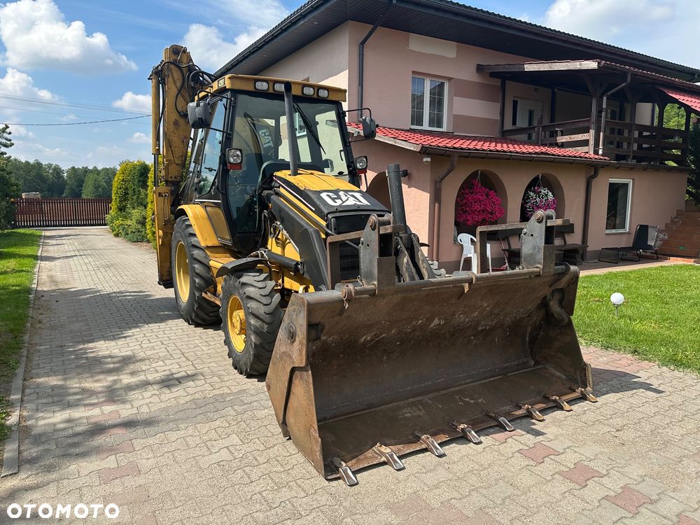 Caterpillar CAT 428D 2002 rok 4x4 moc 80KM - 9