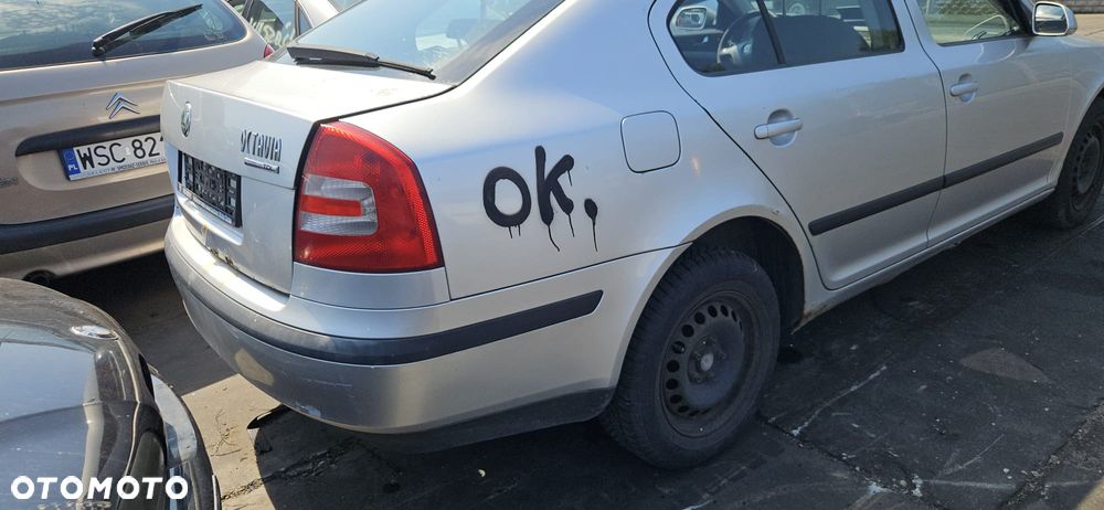 SKODA OCTAVIA II  04-08 1.9 TDI BKC - OSLONA PRZECIWSLONECZNA LEWA PRAWA - 12