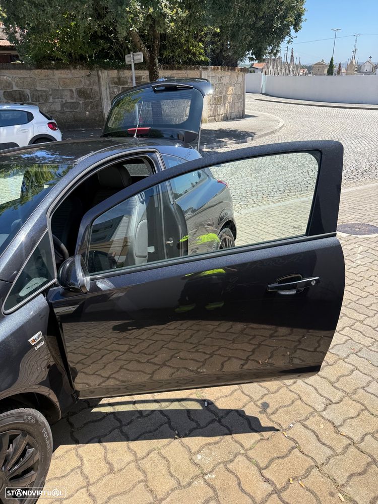 Opel Corsa 1.4 - 11