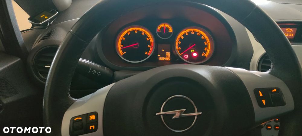 Opel Corsa 1.4 16V Enjoy - 17