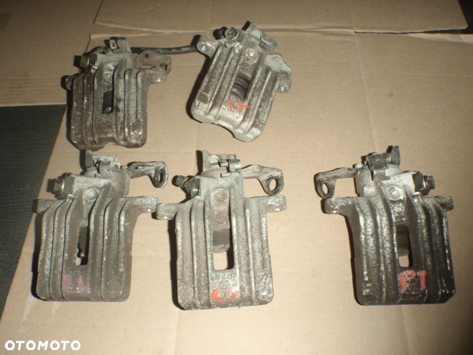 zacisk jarzmo prowadnica hamulcowe tył tylne passat b5 fabia polo golf IV audi a3 a2 ibiza - 14