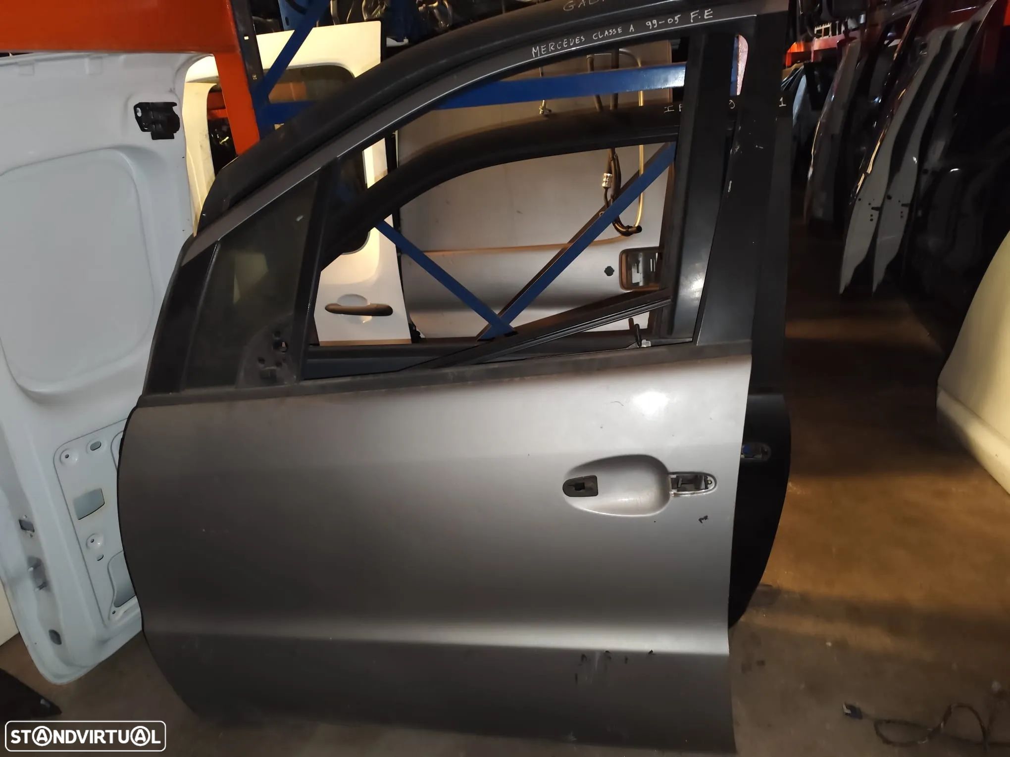MERCEDES CLASS A W168 PORTA FRENTE ESQUERDA - PF162 - 1