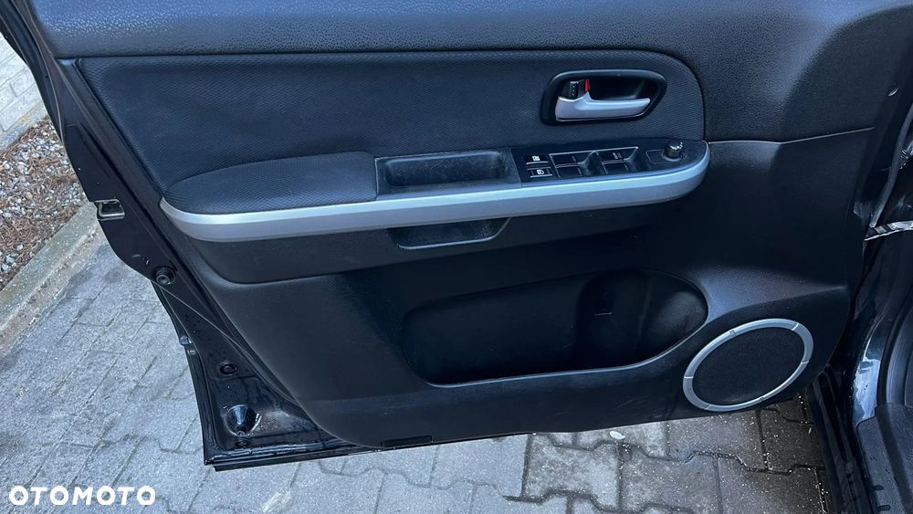 Suzuki Grand Vitara 2.0 Comfort + - 15