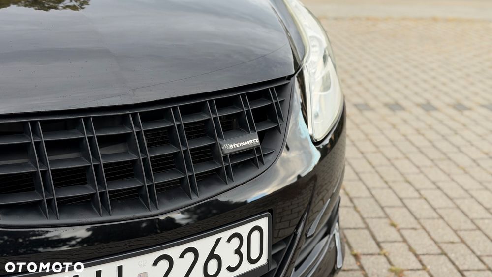 Opel Corsa 1.4 16V Cosmo - 11