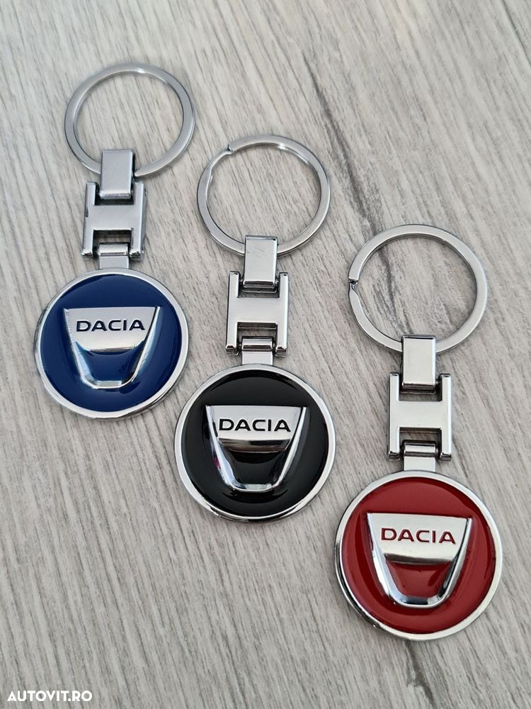 Accesorii-Dacia-Logan-Breloc-Pad-Bord-Capacele-Ventil-Portofel-Auto - 2