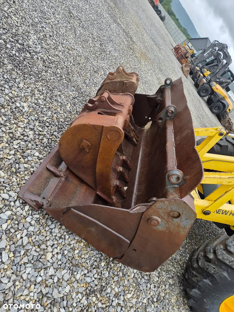 New Holland LB 115 - 23