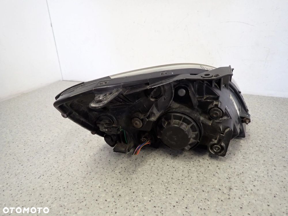 KIA RIO II 10-12 REFLEKTOR LEWY LAMPA PRZEDNIA LEWA - 14