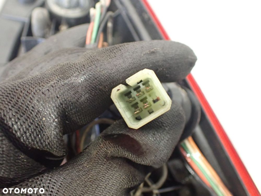 LAMPA LEWA TYLNA SUZUKI WAGON R II 1.3 B - 8