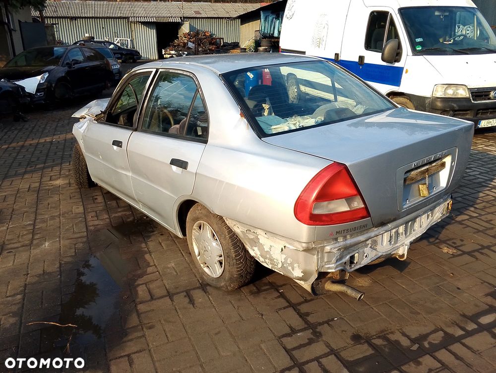 Mitsubishi Mirage CK2A Po Lift (99-03r.) 1.5 B 110KM. Silnik 4G15 Skrzynia F5M41 lakier A69 / A69A. Cały na części. GWARANCJA !!! Przód Tył Zestaw Komplet Drzwi Klapa Zderzak Błotnik Maska Grill Atrapa Szyba Pas Lampa Lusterko Boczki Fotel Kanapa Kokpit Deska Rozdzielcza Przełącznik Włącznik Sterownik Przewody Wiązka Instalacja Moduł Komputer Czujnik Listwa Pompa Alternator Wtryski Głowica Rozrusznik Kompresor Sprzęgło Dwumas Silnik Skrzynia ABS Klimatyzacji Paliwa Wspomagania Kolektor Turbina Przepustnica Zawór Chłodnica Koło Hak Belka Sanki Zawieszenie Mcpherson Półoś Amortyzator Wydech Tłumik Zacisk Most - 4