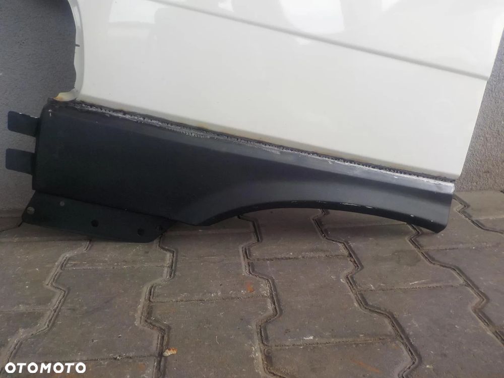 VW T4 CARAVELLE LIFT BŁOTNIK LEWY PRZÓD - 2